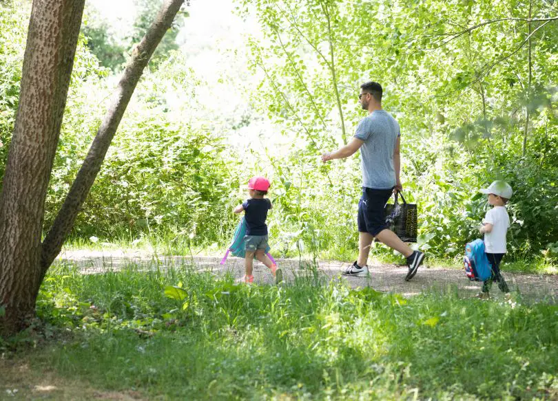 Family walking in a woodland