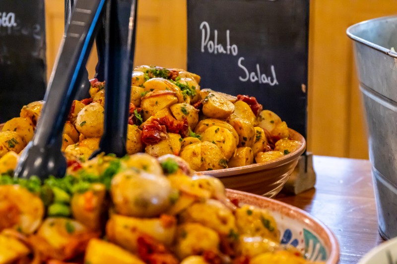 A close up image of a bowl of Nadia's Moroccan potato salad