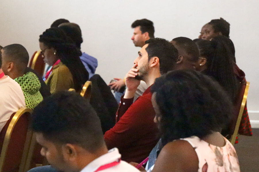 An image of students focusing on a talk in Yew Tree Hall