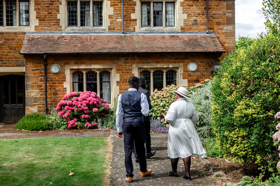 Guests walking around the grounds at Highgate House.