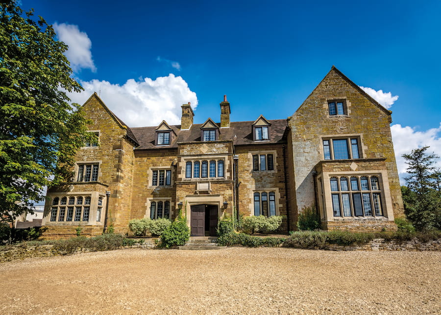 Highgate House during the Summer with blue sky.