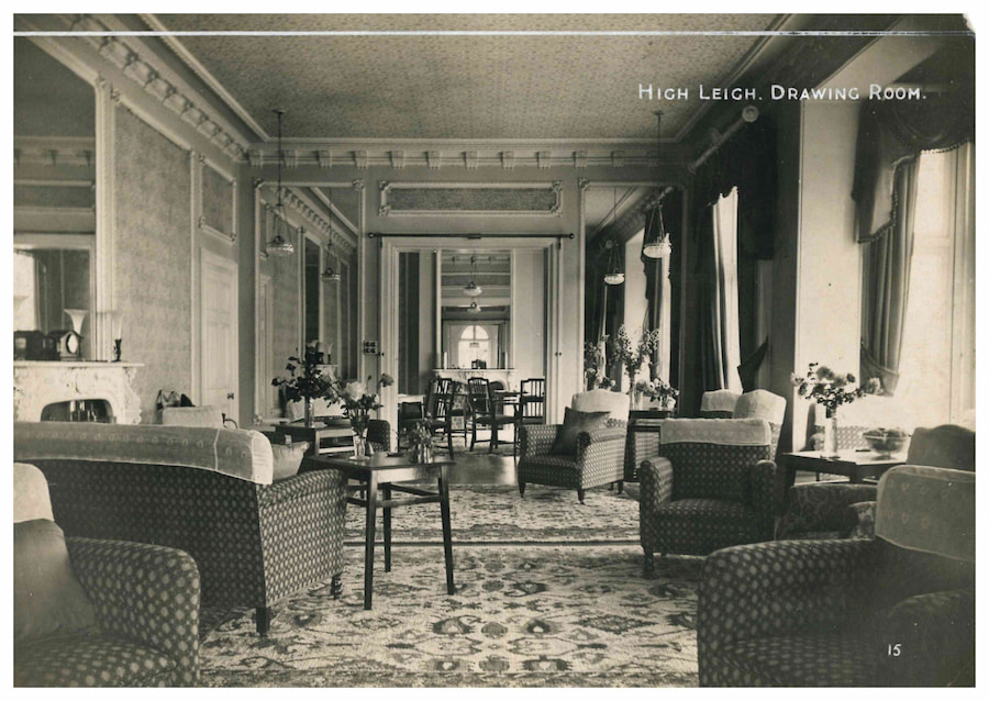 A black and white photo of the Woodlands Lounge from the 1920s showing the exact same old chairs.