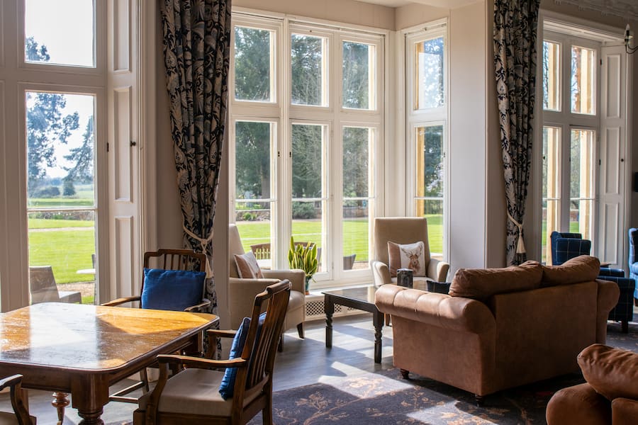 A view of the Woodlands Lounge looking out to the grounds.