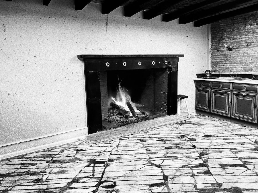 A black and white recreation image of what the fireplace probably looked like when it was part of the kitchen.