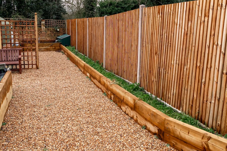 The right hand side fence with a border bed where the fruit trees would be planted.