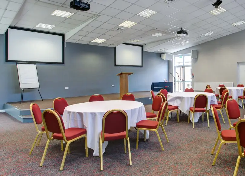 Conference room with av facilities and tables for guests